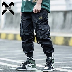 Taktyczne spodnie w stylu Cargo mężczyźni biegacze Streetwear spodnie do kostek wstążki elastyczna talia czarne spodnie Hip Hop męski