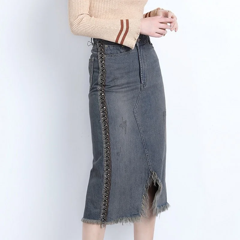 

Waist High Asymmetrical Medium Length Women Denim Skirts Embroidered Flares Ripped Tassel Female Vintage A-Line Skirts Plus Size