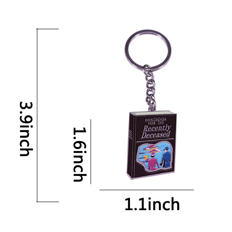 Tim Burton Betelgeuse Handbook Adam and Barbara movie spooky Gothic jewelry keychain key ring reads like stereo instructions