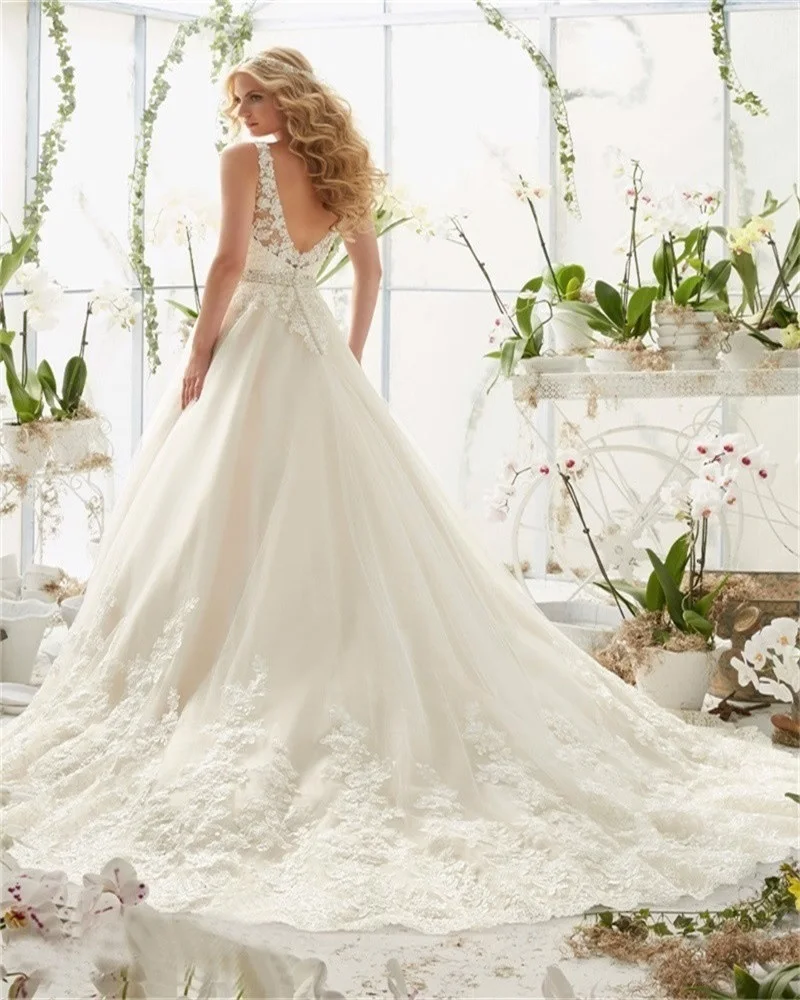 Sexy Lace Wedding Dresses Long Train Simple Bride Floor Length Long Sleeve Applique Lace up Open Back Wedding Dresses