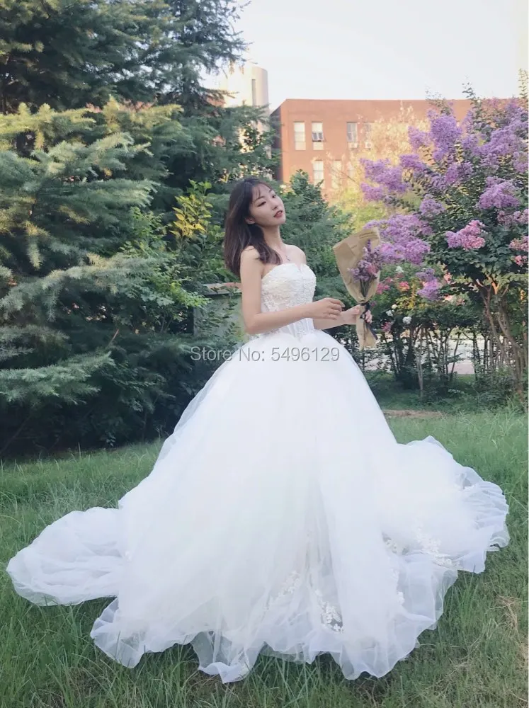 Elegant Tulle Lace Bodice A Line Wedding Dresses Sexy Strapless Sleeveless Sweep Train Bridal Gown 2023 Formal Bride Dress Ivory