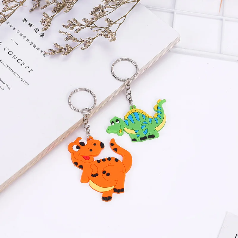 100Pcs/Pack Mix Design Dinosaur Keychain Kids Silicone PVC Keyring Men Women Student Backpack Pendant Auto Keychains Promo Gift