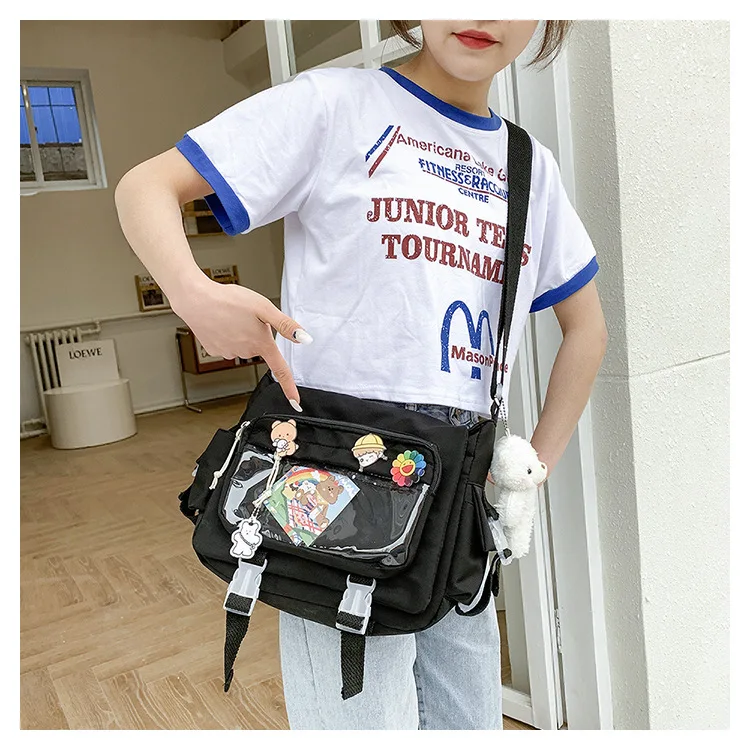 Bolso de mensajero con bolsillo transparente para mujer, bandolera bonita con insignia de dibujos animados, estilo Kawaii para estudiantes