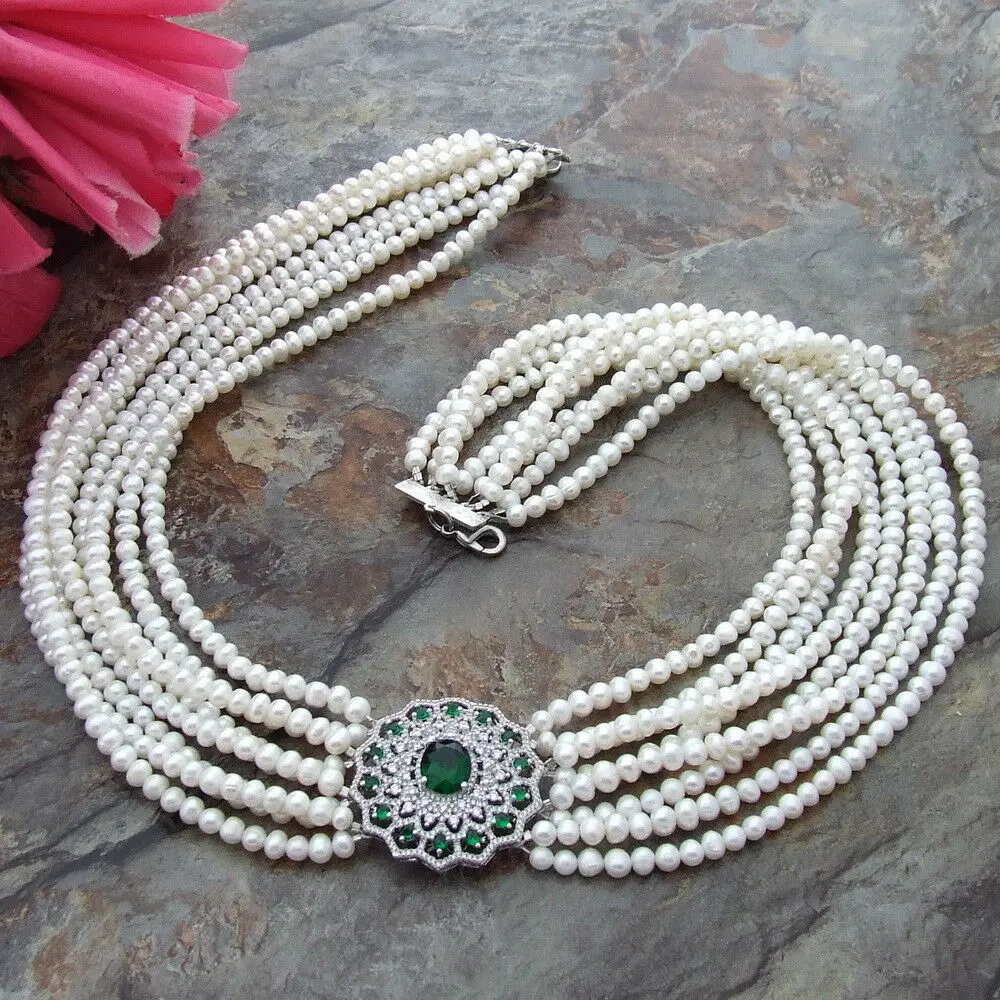 

natural 8Strands 4-5MM White freshwater Pearl Necklace 19-20" & green zircon Pendant