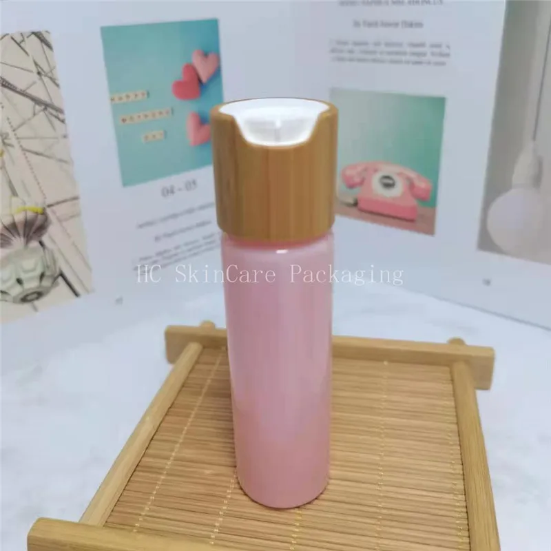 

Free Sample Empty Bamboo Disc Cap Shampoo Container In Stock Goods Flat Shoulder PET Plastic Bottle Cosmetic Packaging