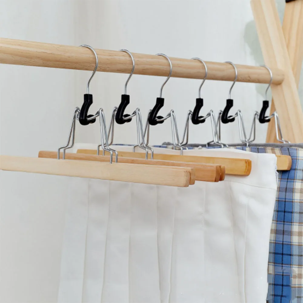 

Grade Wooden Pants Hangers with Clips Non Slip Skirt Hangers Smooth Finish Solid Wood Hanger with 360° Swivel Hook