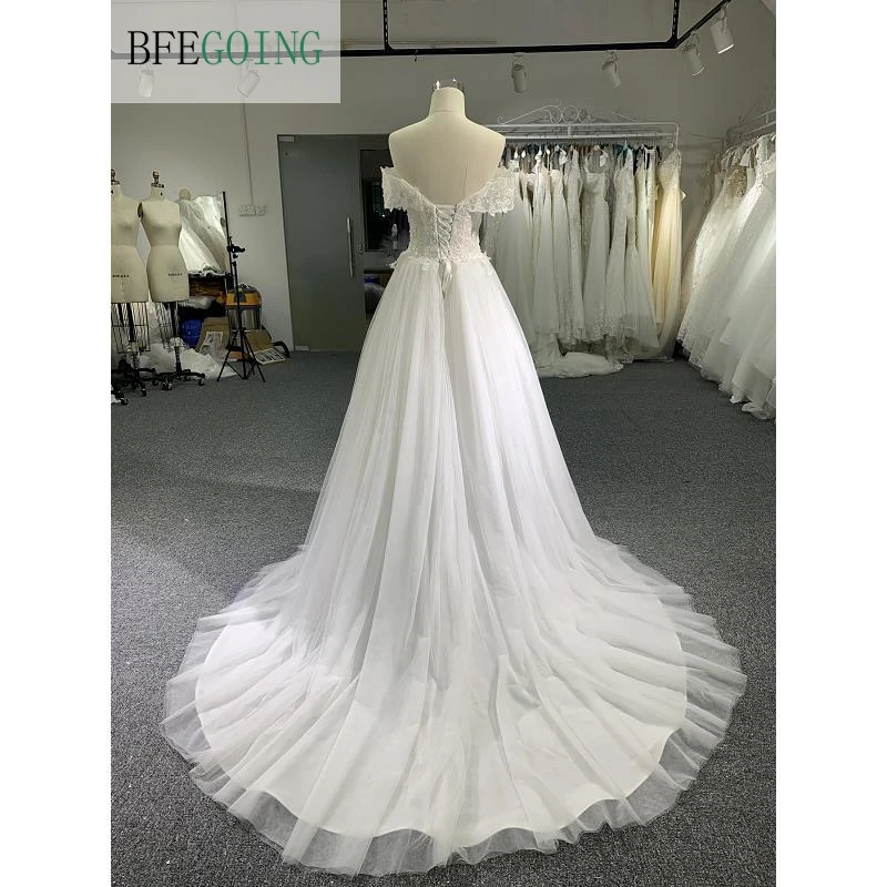 Vestidos de novia de encaje de marfil, vestidos de novia de línea a, longitud hasta el suelo, con cuentas y hombros descubiertos, con forma de corona Tran, con escote Corazón, hechos a medida