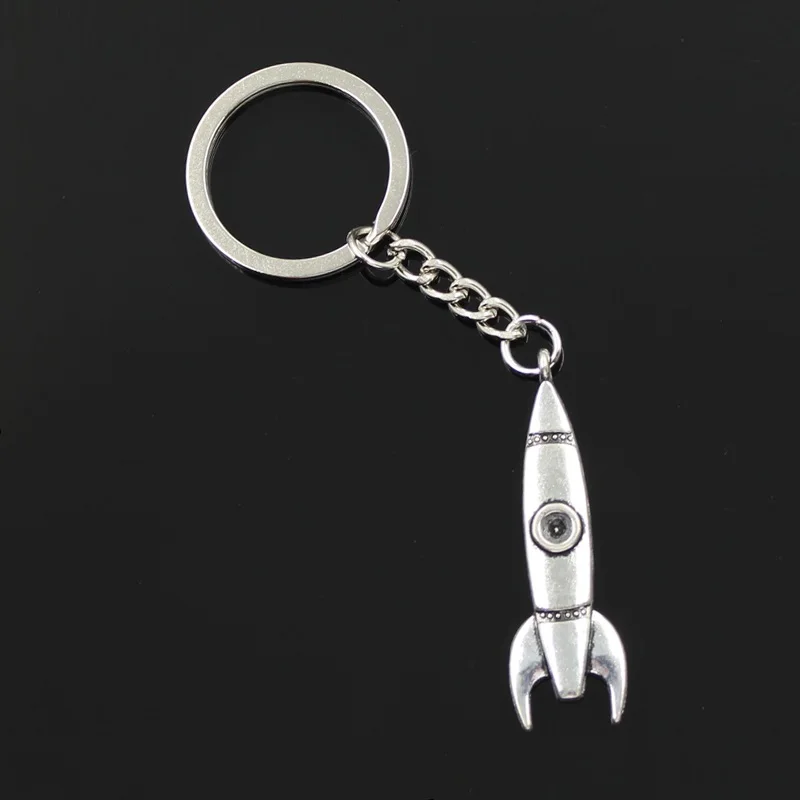 Nowe mody mężczyzna 30mm brelok DIY metalowy uchwyt do łańcuszka Vintage rakieta rakietowa 50x15mm srebrny kolorowy wisiorek prezent