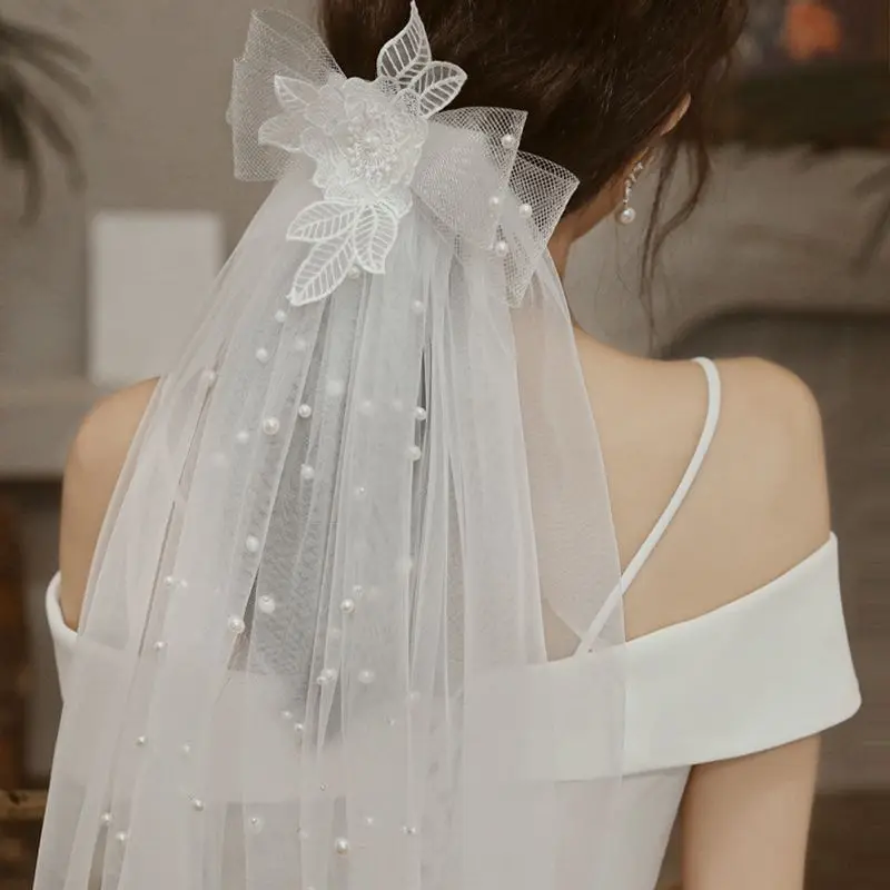 ใหม่มาถึง Welon Ivory Wedding Veils ลูกปัดไข่มุกโบว์หวีสั้นผ้าคลุมหน้าเจ้าสาว Casamento งานแต่งงาน accesorios de la boda