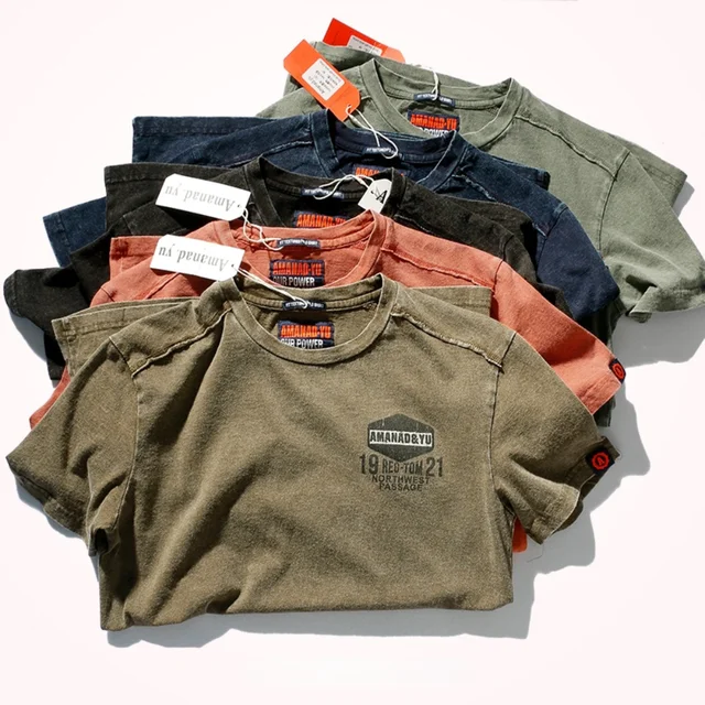 Letnia nowa koszulka z krótkim rękawem Męskie modne średniej długości okrągłe topy z czystej bawełny