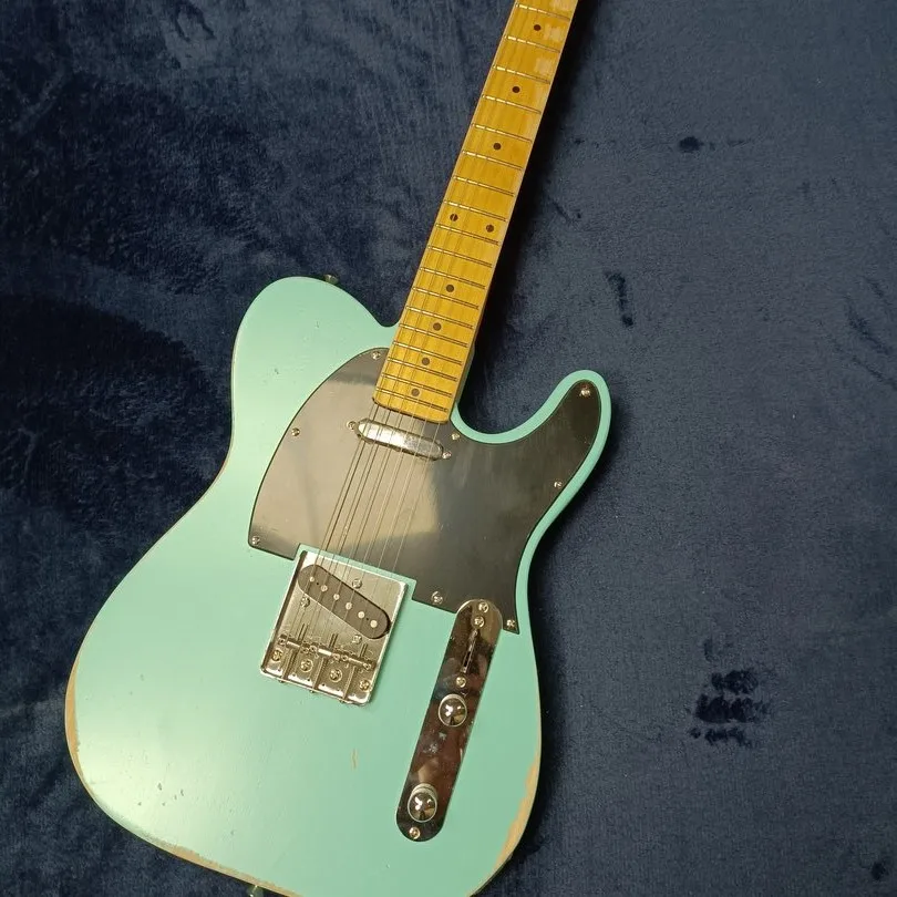 Handmade old 6-string electric guitar, basswood body, light green paint, support customization, free delivery.