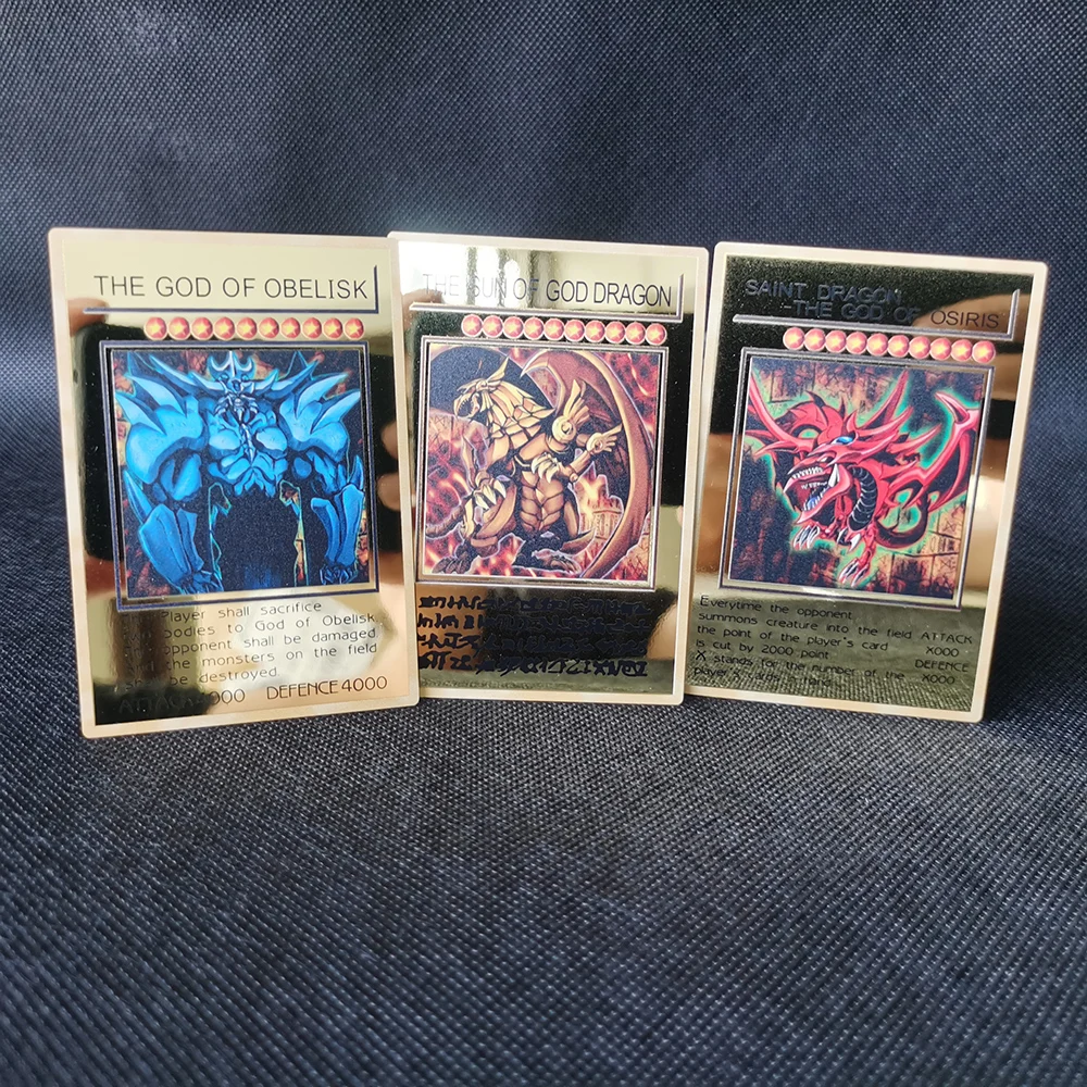 Yugioh การ์ดโลหะสีทอง Yu-Gi-Oh คอลเลกชันการ์ดตาสีฟ้า Dark Magicial Obelisk Slifer Ra เด็กวันเกิดคริสต์มาสของ...