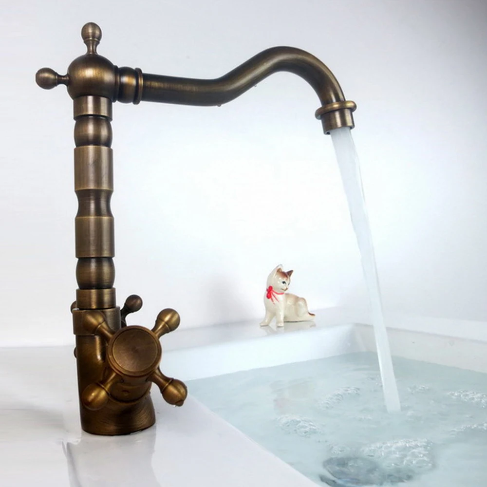 

Black bronze retro antique copper hot and cold household washbasin faucet under splashback