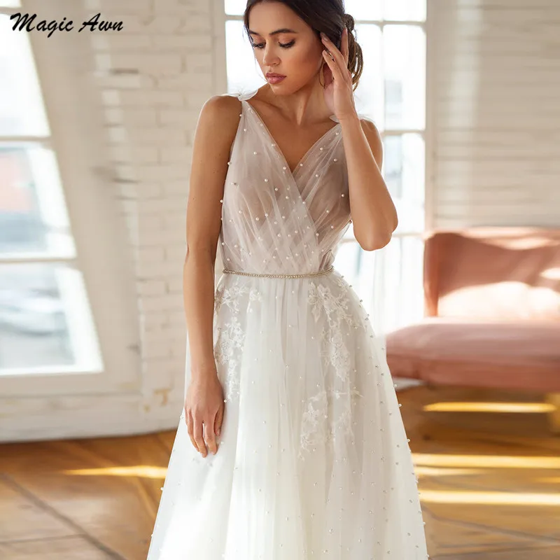 Magic Awn Graceful Boho abiti Da Sposa Appliques di pizzo perle perline abiti Da spiaggia Mariage con cinturini a fiocco Illusion Abito Da Sposa