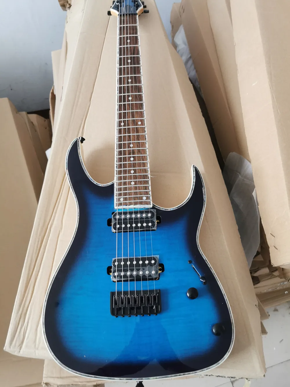 7 Strings Blue body Electric Bass Guitar with Flame Maple Veneer,Neck through body,Black Hardware,offer customized