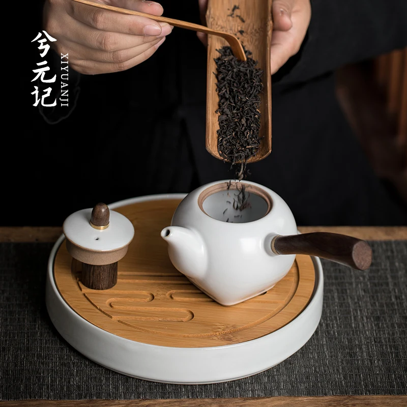 |sour branch wood in Ru kiln can be raised into pieces. A single teapot is a simple one pot kungfu tea set for home use