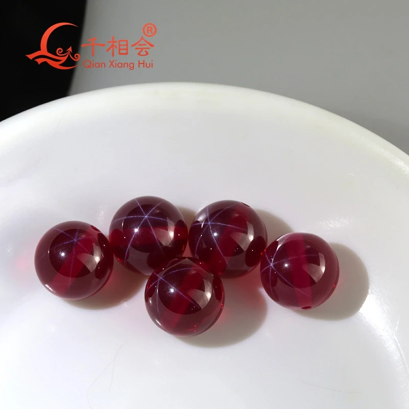 Transparent  artificial star sapphire  ruby red color sphere shape ball shape  stone corundum with full hole loose gemstone