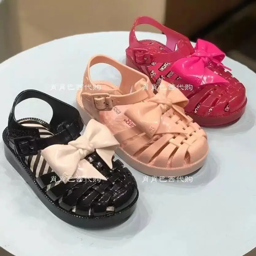 2021 New Mini Melissa Summer sandals Girl and boy Roman Bow Shoes Soft Sparke Fashon Jelly Shoes Melissa Beach Sandals Shoes