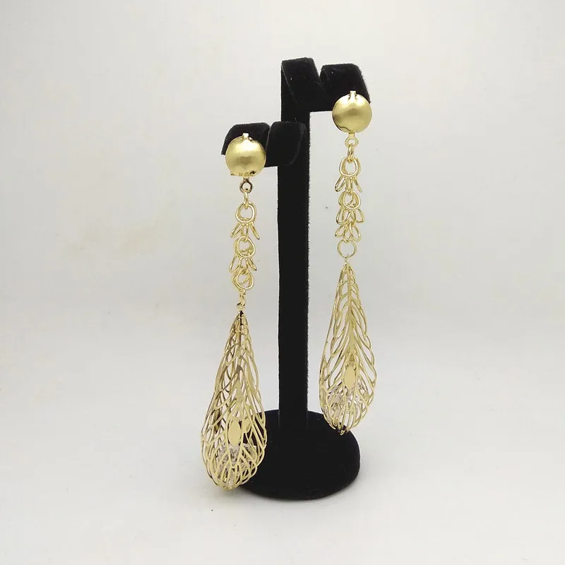 

Kingdom Ma Wholesale Unique Leaf Long Drop Earrings Africa Earrings for Women Fashion Female Jewelry Gold Color Wedding Earring