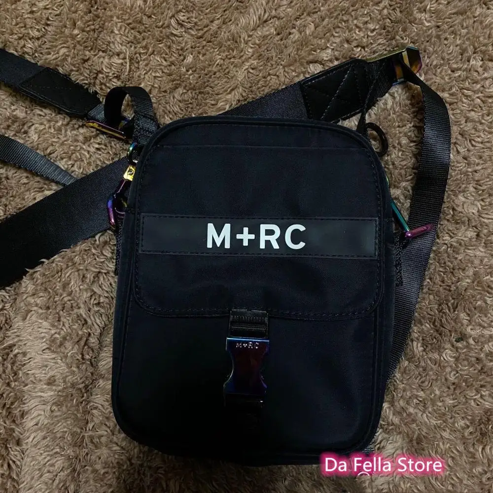 Newest M+RC NOIR Rainbow Bags Men Women Hip Hop Backpacks 2020 1:  M+RC NOIR Bag Colored metal buckle Backpack transparant GHOST