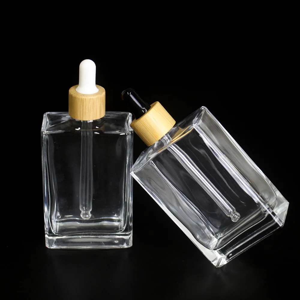 Spot Wholesale 100ml Square GlassTransparent Dropper Bottle Cosmetic Bamboo Cover Essential oil bottle container