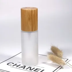 Empty 50ml glass frosted Bottle Lotion Pump spray pump with Bamboo cap