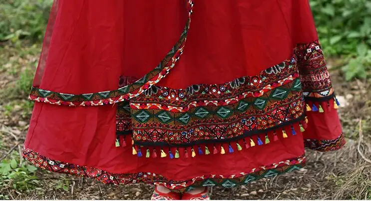 تنورة شبكية بشرابة بدلة حمراء في عطلة الربيع والخريف على الطراز الوطني مكونة من قطعتين ملابس نسائية جديدة من القطن والقنب