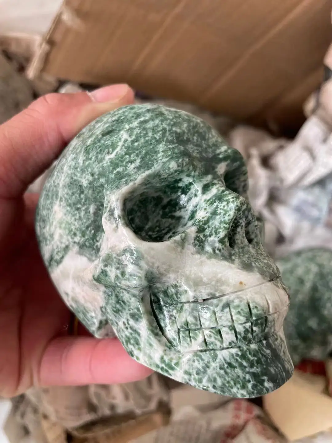 

African green Skull statuettes, realistic statuettes carved in natural stone and mineral healing home Decorative art collection