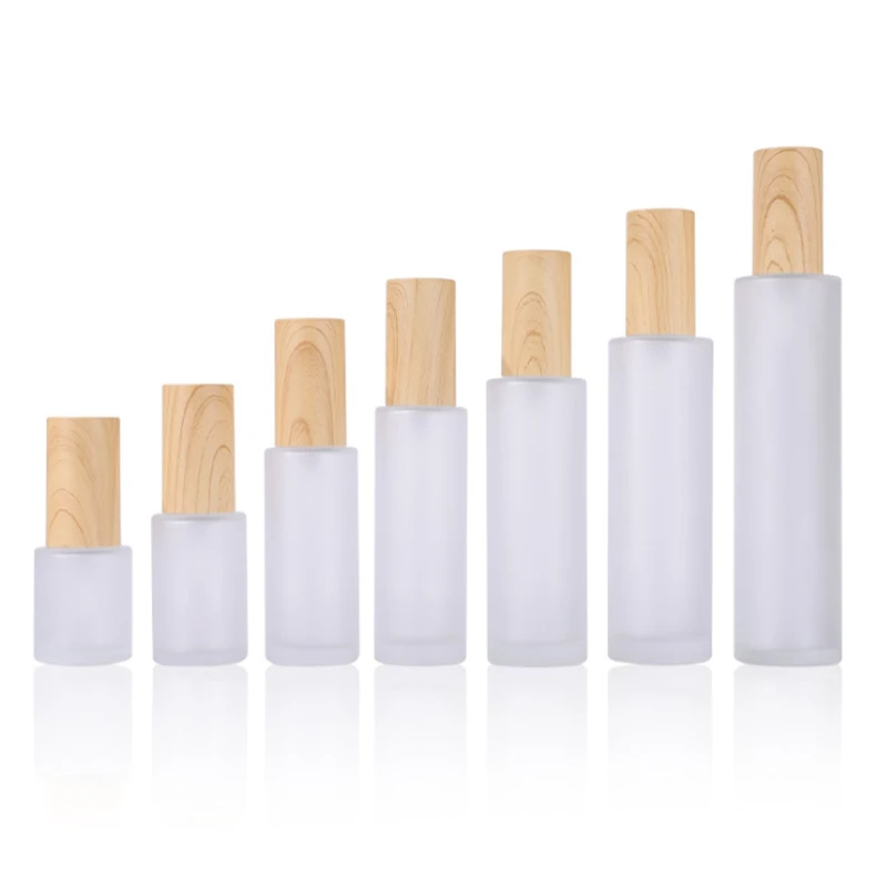 50pcs 20ml~120ml Frost Glass Lotion Spray Bottles 50ml Empty Matte emulsion liquid bottle with wood lines plastic cap