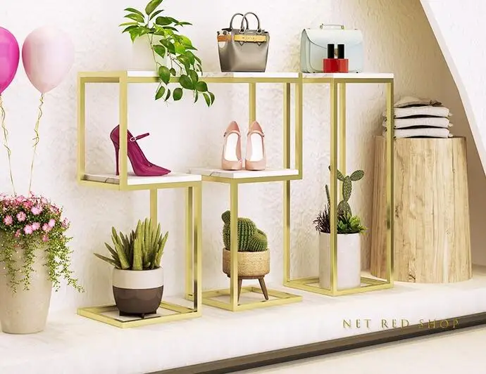 Clothing store window display table women's clothing store racks personality Nakajima shoe bag display rack water table