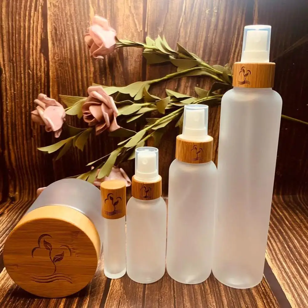 

2oz 4oz 8oz frosted cream plastic jar spray bottle lotion bottle glass bottle with bamboo spray cap bamboo cosmetic packaging