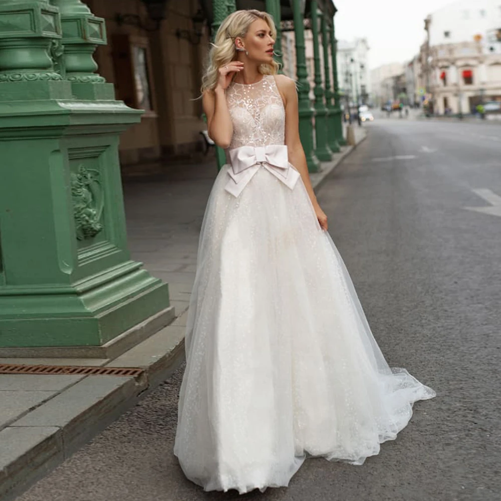 Abito da sposa in Tulle a pois a-line o-collo bottone con paillettes in pizzo senza maniche abito da sposa principessa Bow Sweep Train Vestidos De Novia