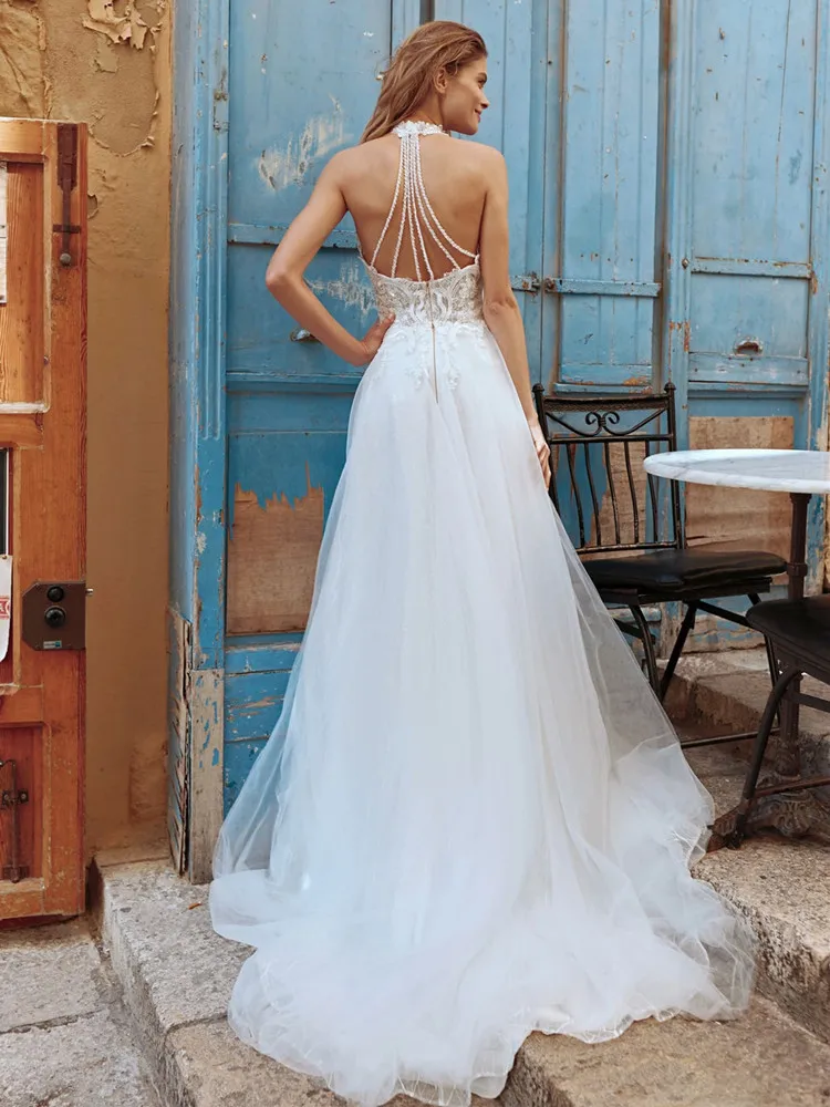 Halter abiti da sposa 2024 scollo diviso Appliques di pizzo perline Backless Sweep Train per Princess Robe De mariee Soft Tulle