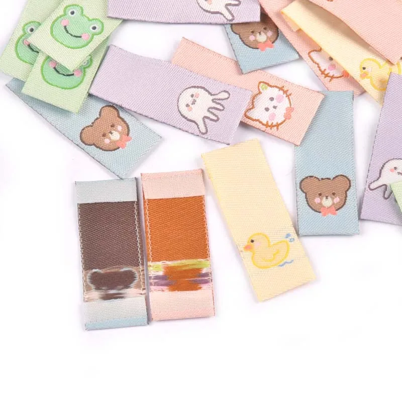 50Pcs Cat/Bear/Octopus/Frog/Duck Embroidery Washable Labels For Sewing Accessories Care Bags Clothes Tag Handmade Crafts c3161