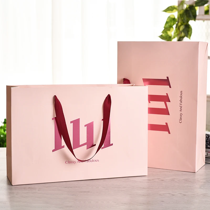Venta al por mayor, 500 unids/lote, bolsas de compras de papel de lujo de alta gama con mango de cinta, personaliza tu propio logotipo impreso para joyería de mujer