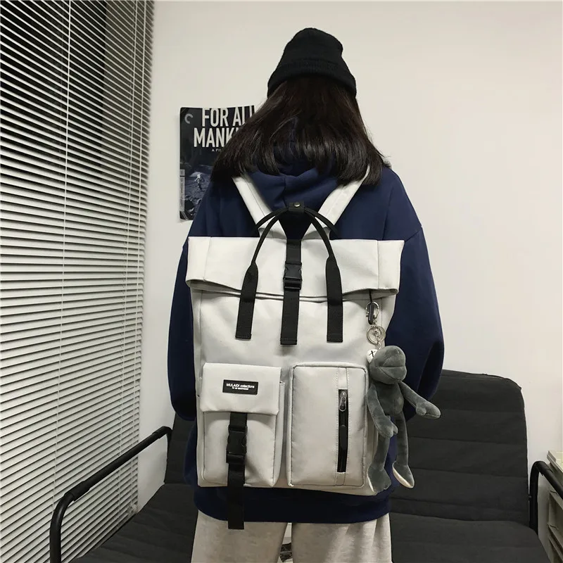 Japanese fashion backpack female high school students Korean tooling schoolbag male large capacity square travel computer bag.