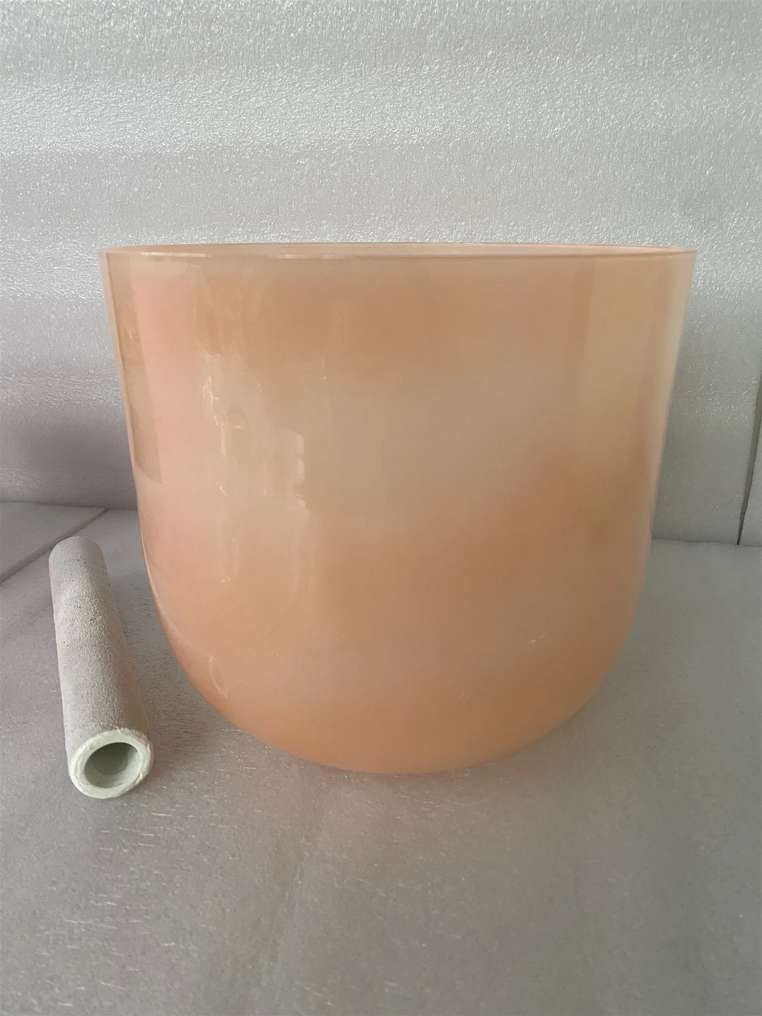 

Crystal singing bowl orange pastel color 3rd octave D note sacral chakra 432Hz for sound healing.