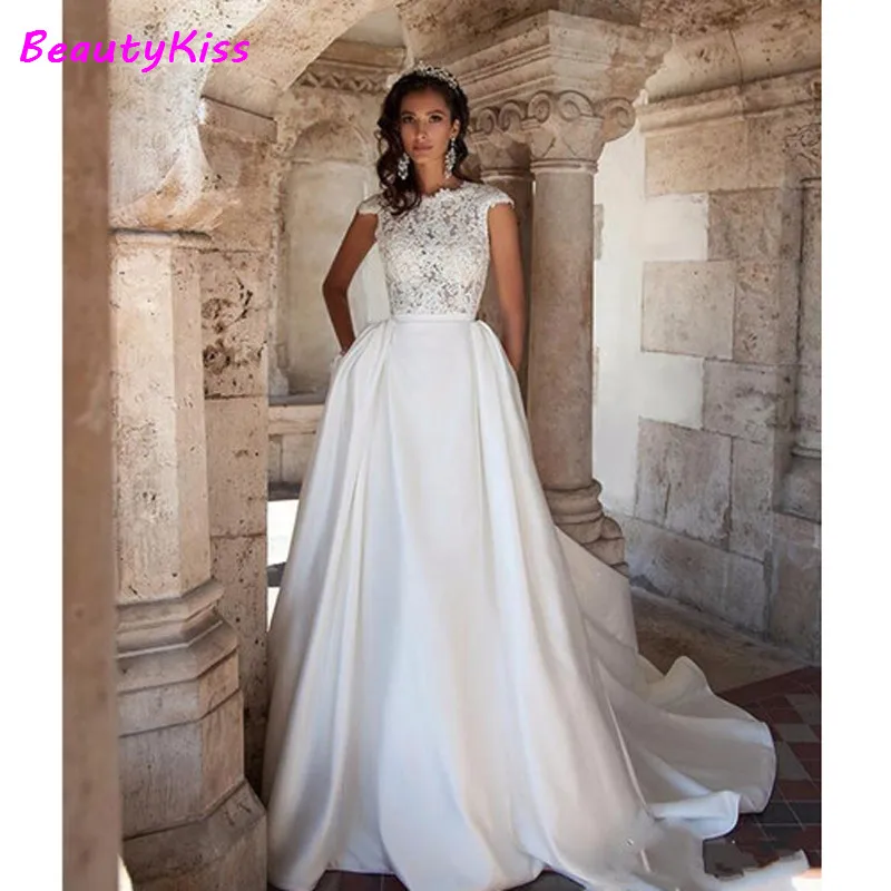 Robe de mariée trapèze style Boho en Satin, tenue de princesse élégante avec poches en dentelle, col rond, manches cape