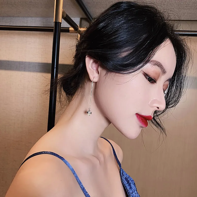 Korean hot selling fashion jewelry creative copper inlaid zircon fish pendant ear line cute and elegant female earrings