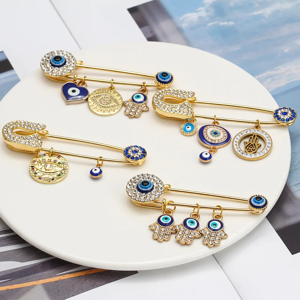 EVIL EYE Dropping Oil Blue Turkish Evil Eye Tassel Brooch Pin Gold Silver Color Heart Hand Charm Brooch for Women Girls BE218