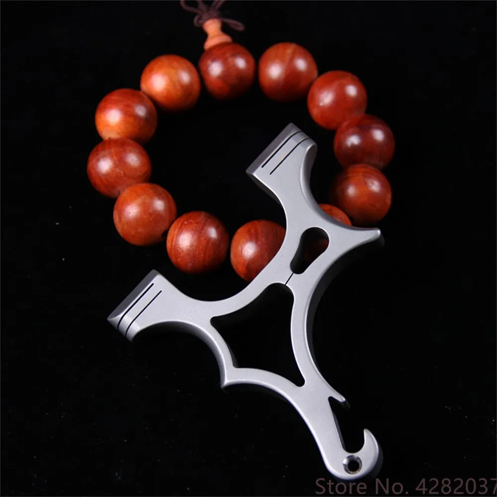 

Outdoor Shooting Hunting Slingshot TC21Titanium alloy Slingshot Catapult Bow With Rubber Band Multifunction bottle opener tool
