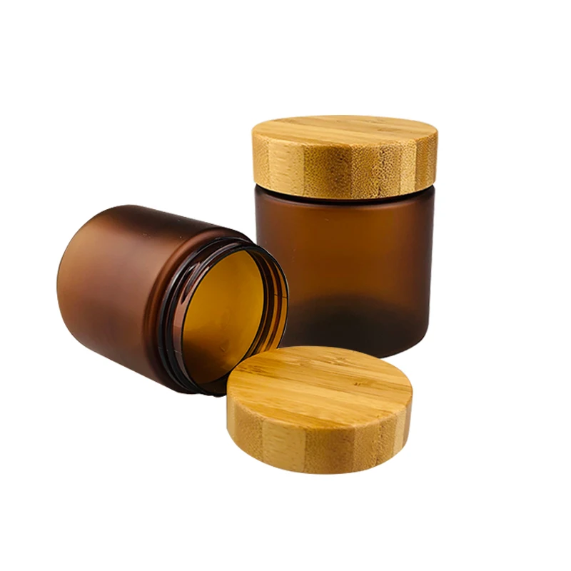 

Wholesale 250g Frosted Amber Plastic Empty Refillable Cream Jars Cosmetic Containers with Bamboo Wood Lid