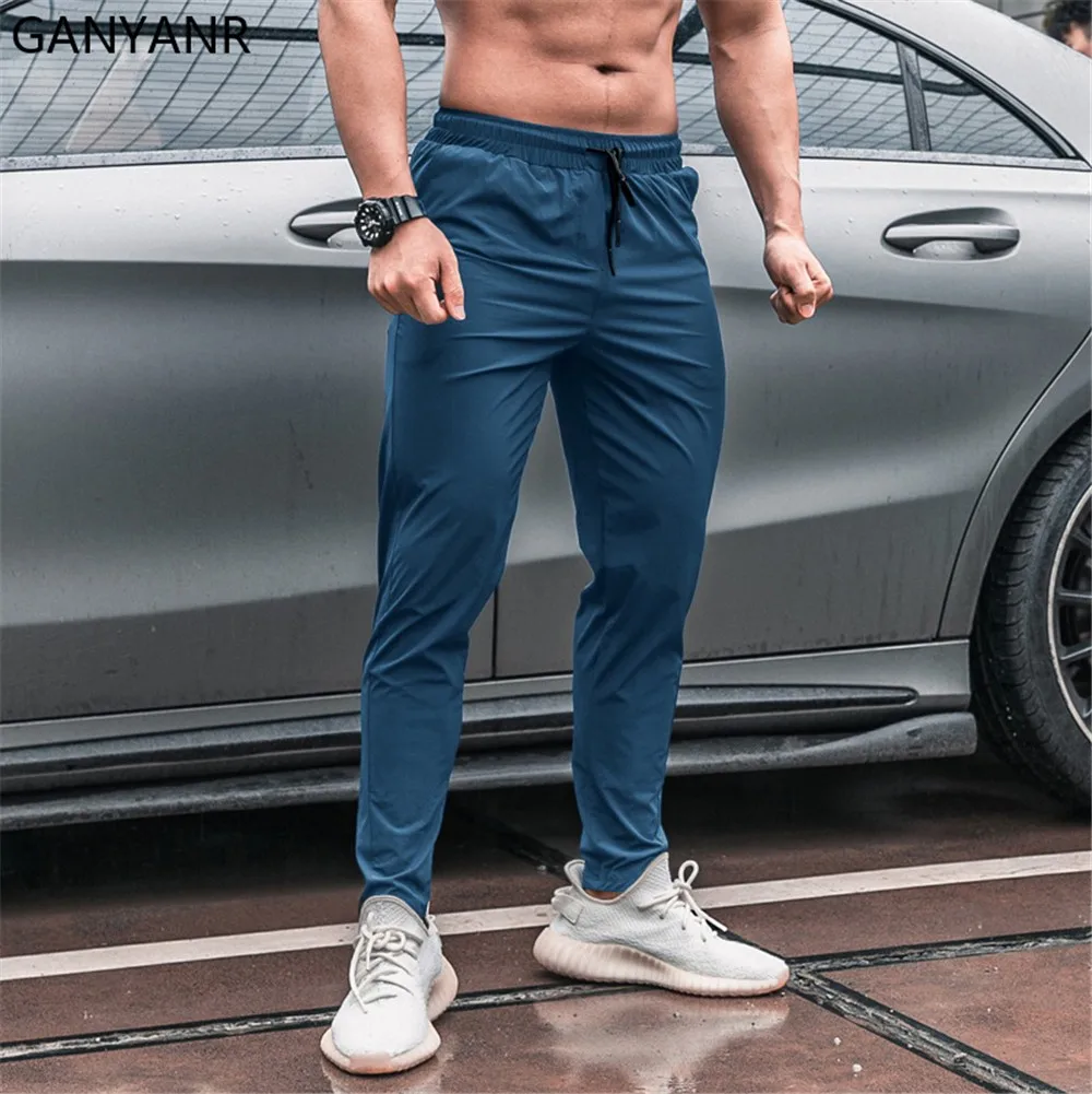 

GANYANR Jogging Pants Men Training Gym Sports Running Sportswear Leggings Trousers Trackpants Workout Sweatpants Bodybuilding