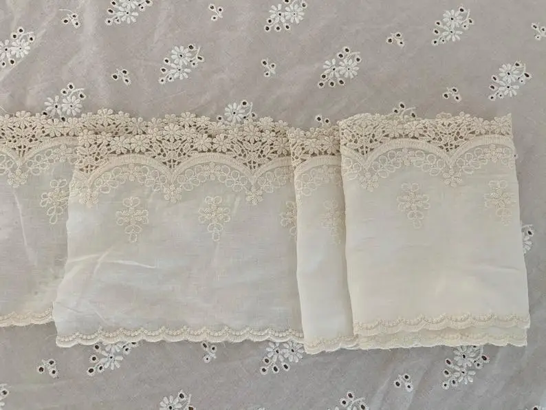 

Белоснежная натуральная хлопчатобумажная кружевная отделка, нежная вышитая кружевная отделка, двойная кружевная отделка с зубцами по ярдам.