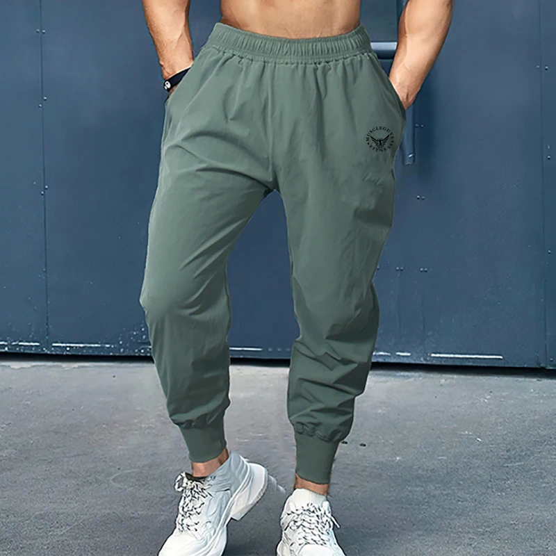 Joggers de entrenamiento para hombre, pantalones informales, deportivos, de moda, ajustados, negros, para gimnasio