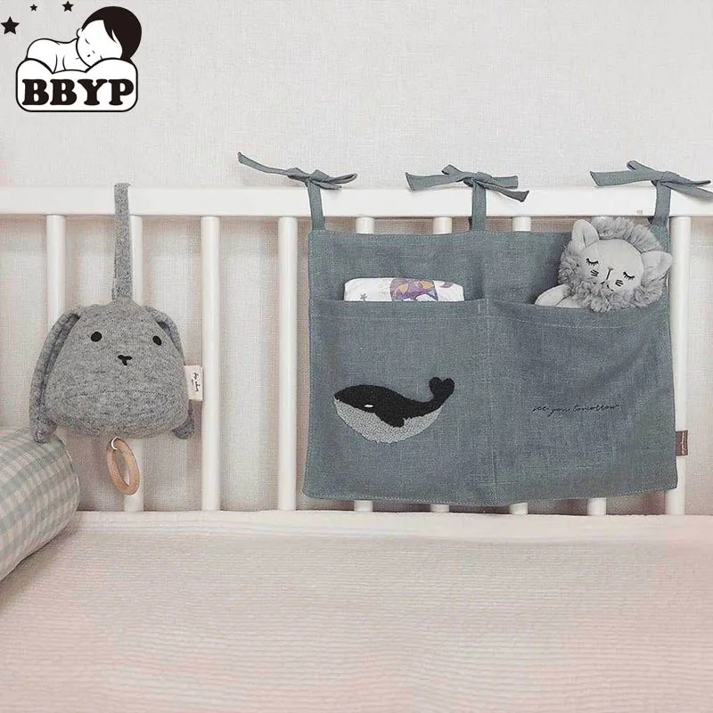 

Bedside Storage Bag Embroidery linen Baby Crib Organizer Hanging Bag for Baby Essentials Newborn Bed Hanging Diaper Toy Tissue