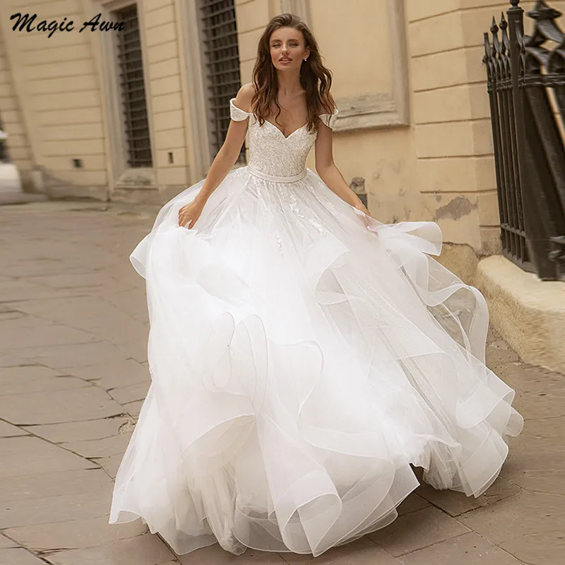 Magic Awn Mới Lệch Vai Váy Áo 2021 Ren Appliques Công Chúa Phồng Cô Dâu Đồ Bầu Phối Ren Lưng Vestidos Branco