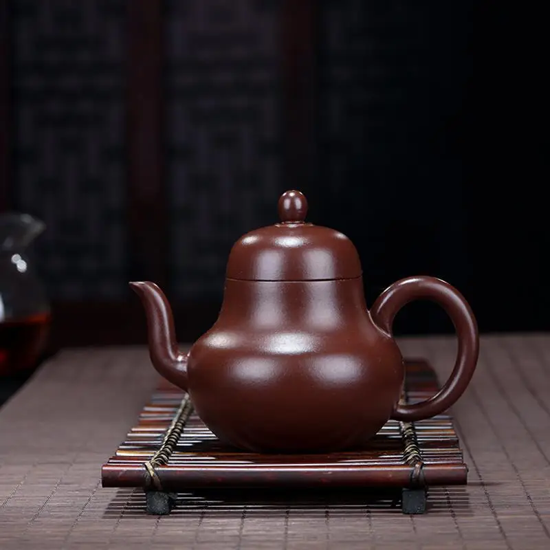 

Yixing Zisha teapot Yan Liquan handmade raw material Zizhu nisiting teapot home kungfu tea set painting gold