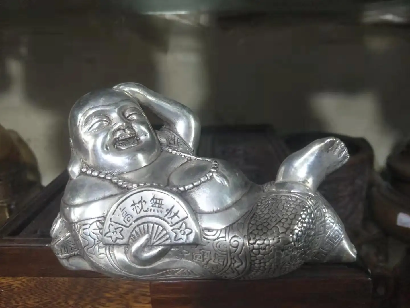 rare old  silver statue,Look at the future with a smile, Buddha statue