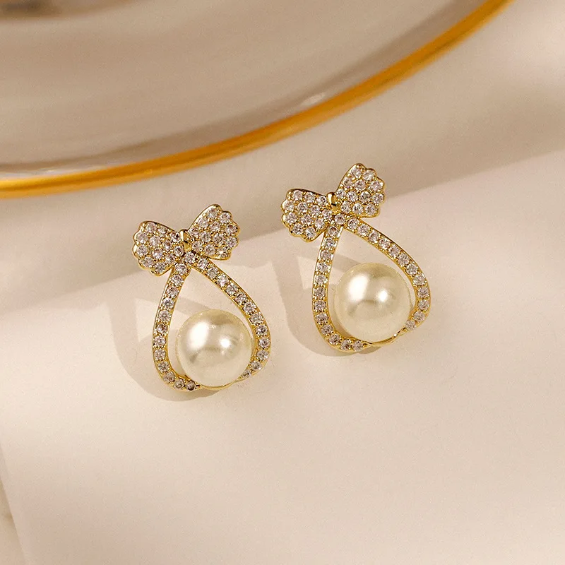 2021 Fashion New Temperament Earrings, Small Bow, Pearl Crystal Earrings, Net Celebrity All-match Manufacturer Sales Earrings